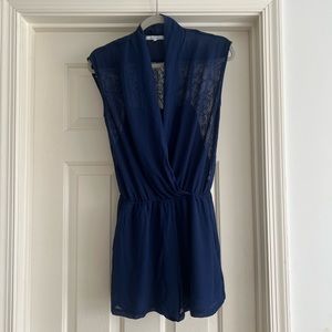 Naked Zebra romper size medium in navy blue.